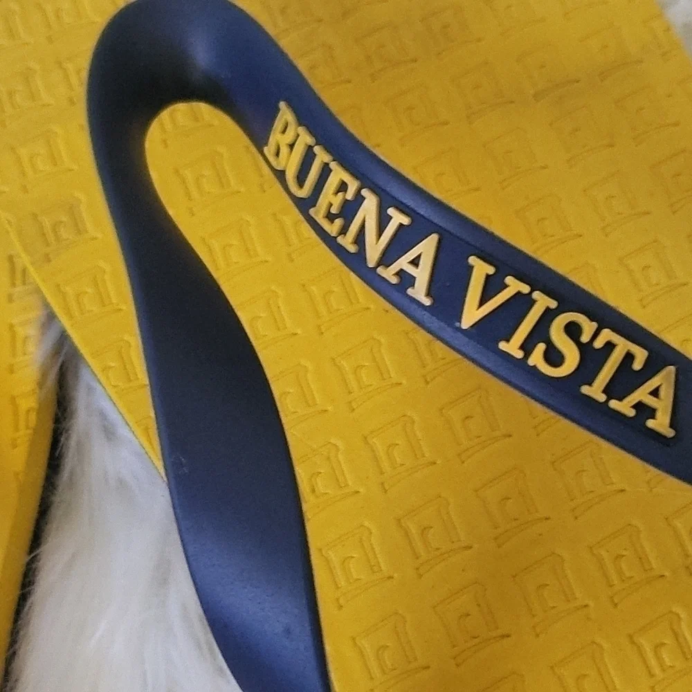 *PRICE DROP* Neet Feet Buena Vista yellow and blue flip flops NWOT